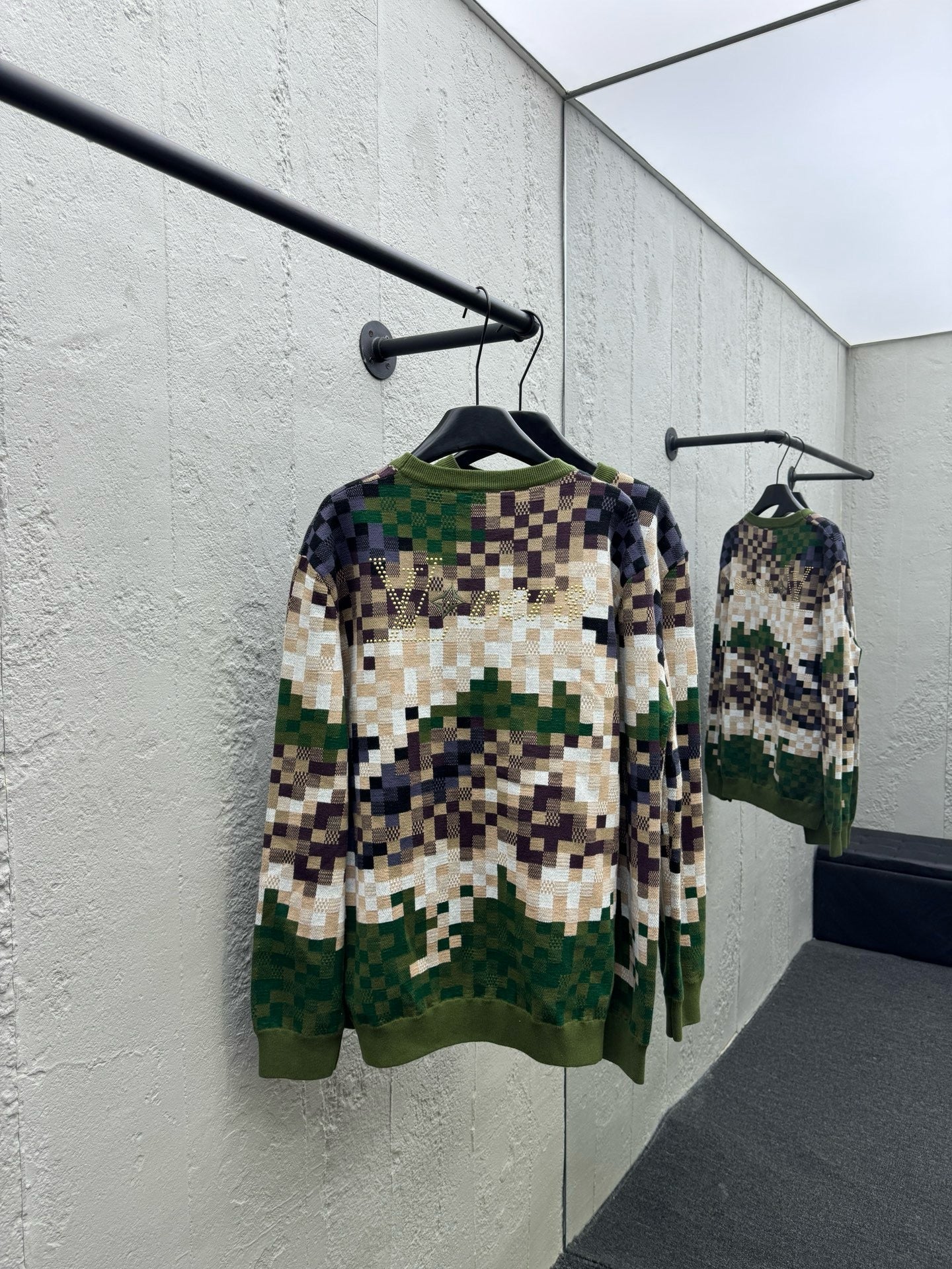 Pull en maille à carreaux vert camouflage
