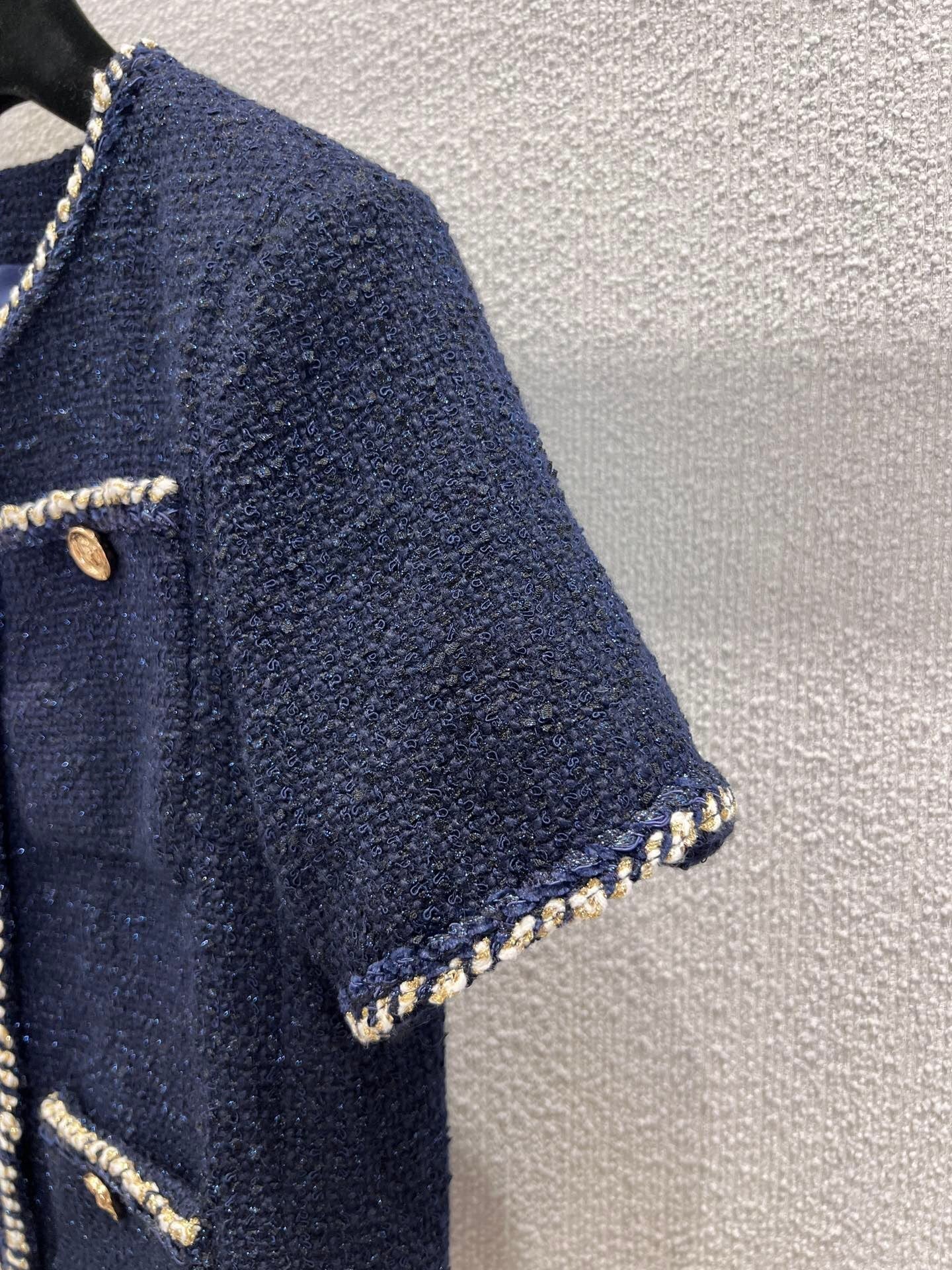 Banded hem short-sleeved bouclé jacket