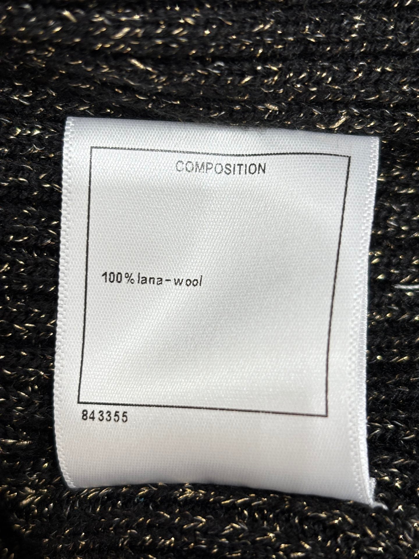 Débardeur en tricot tweed noir et blanc à motifs métallisés 