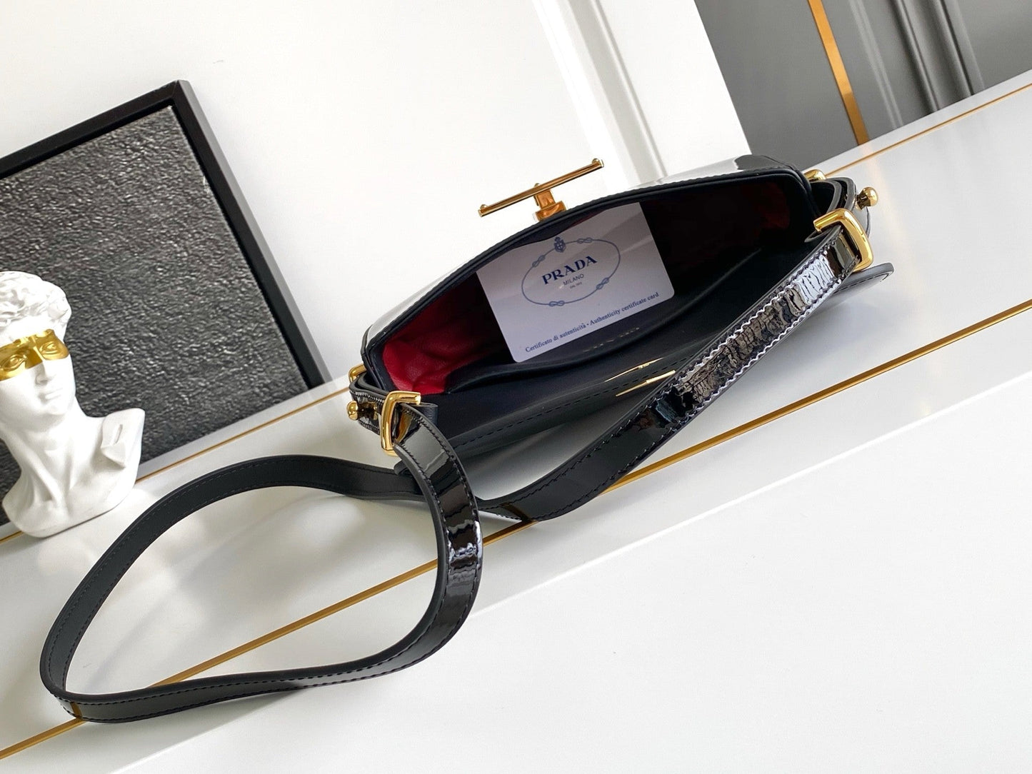 Black Patent Leather Baguette Bag with Gold Accents