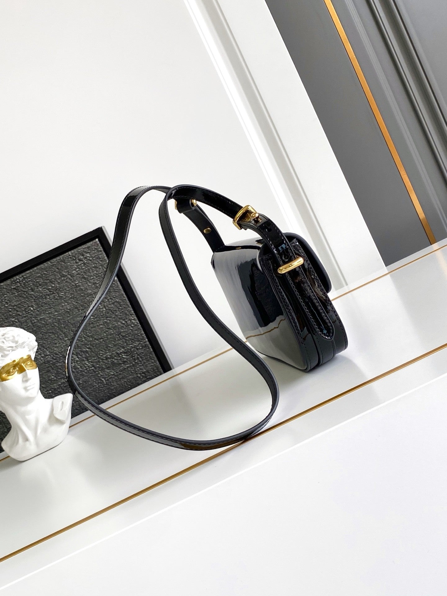 Black Patent Leather Baguette Bag with Gold Accents
