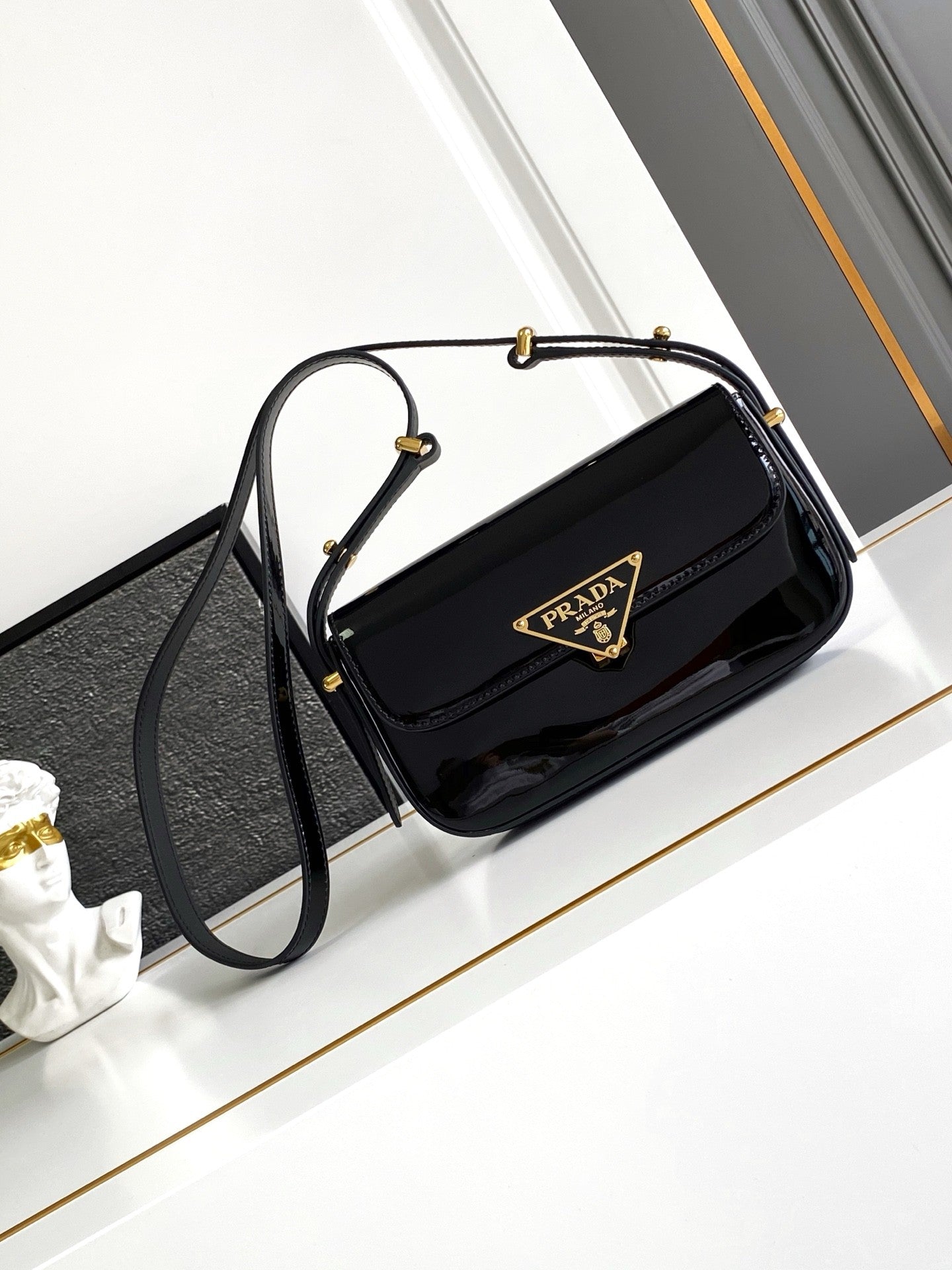 Black Patent Leather Baguette Bag with Gold Accents