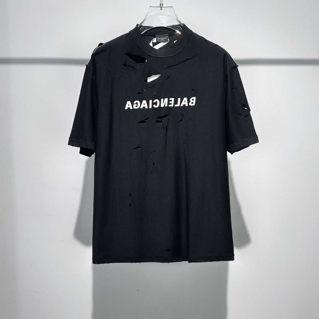 Le nouveau couteau à la mode de l'été coupe des trous dans le t-shirt court à col rond en coton, 