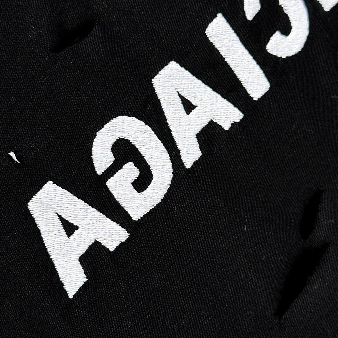 Le nouveau couteau à la mode de l'été coupe des trous dans le t-shirt court à col rond en coton, 