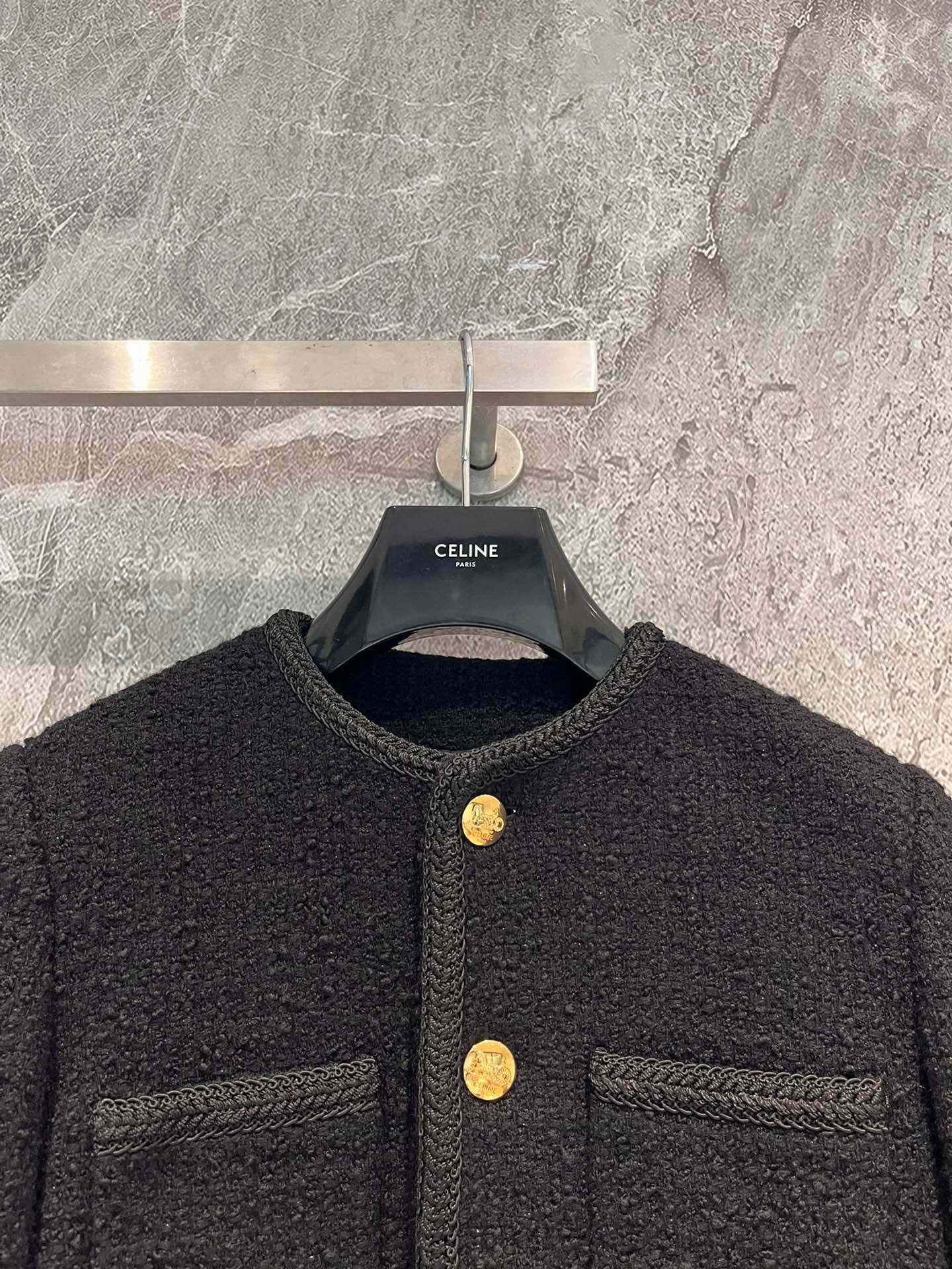 Veste en tweed noir et or