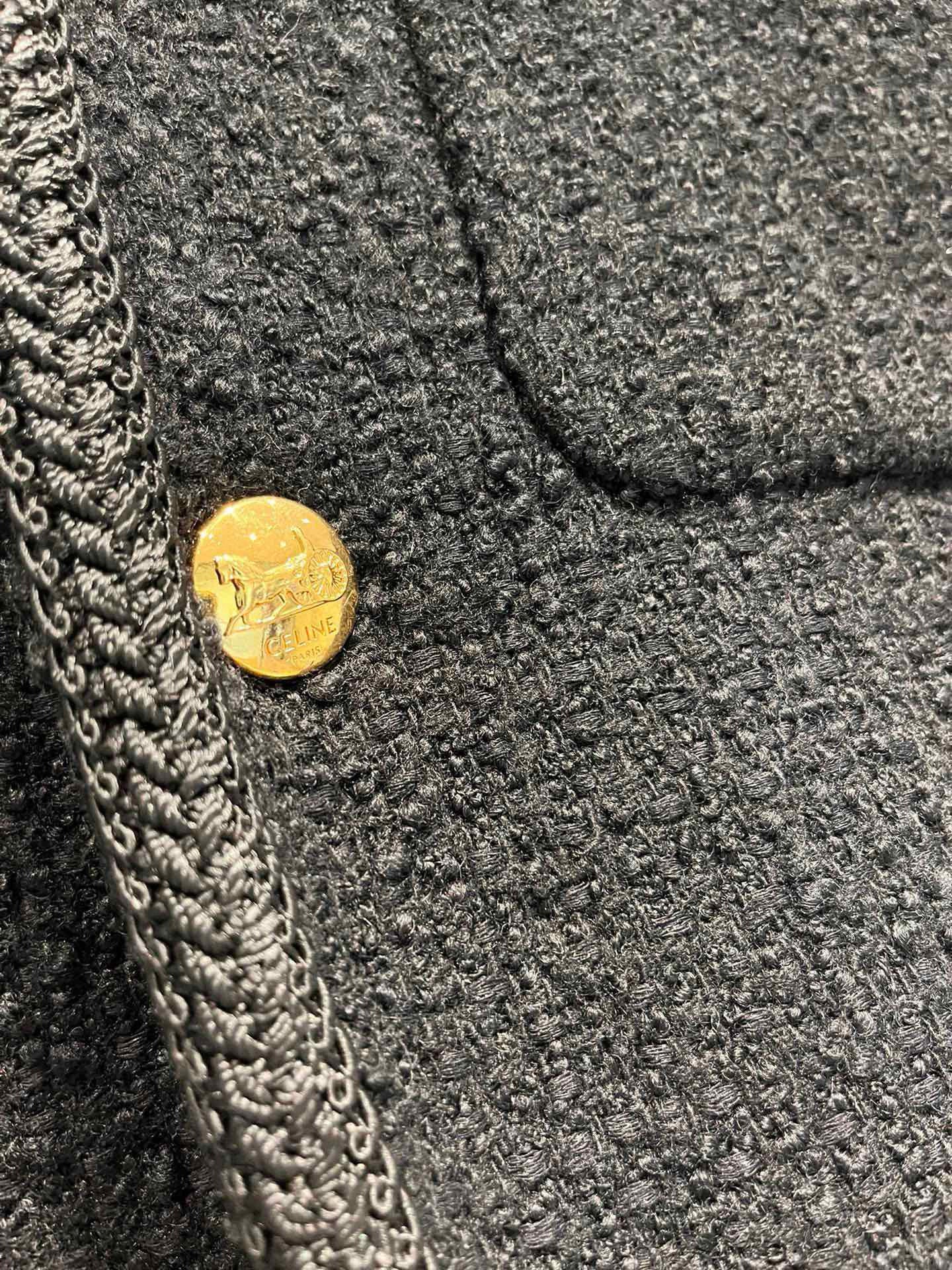 Veste en tweed noir et or