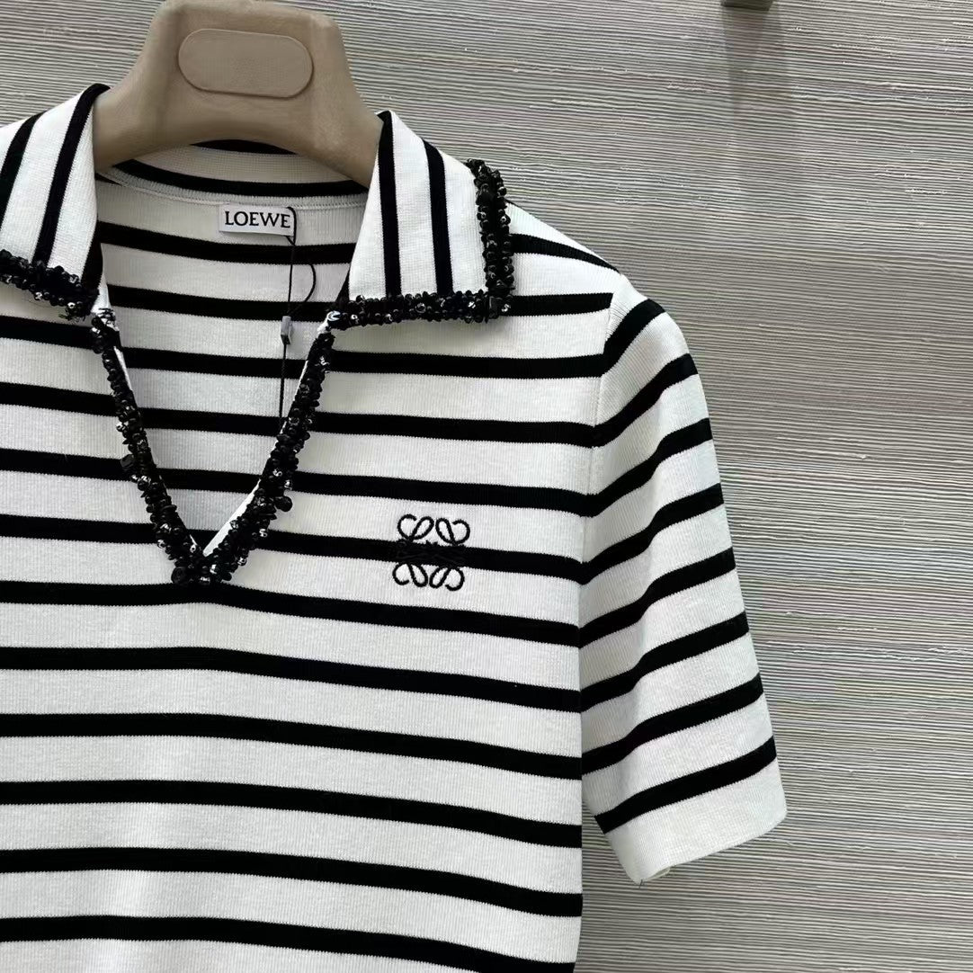 Polo rayé en tricot à manches courtes