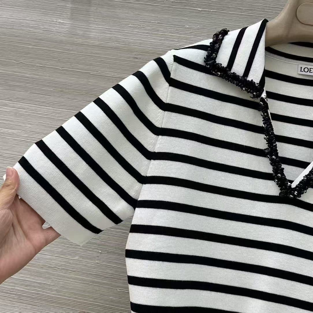 Polo rayé en tricot à manches courtes