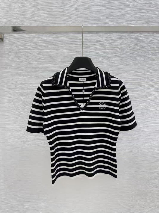 Polo rayé en tricot à manches courtes