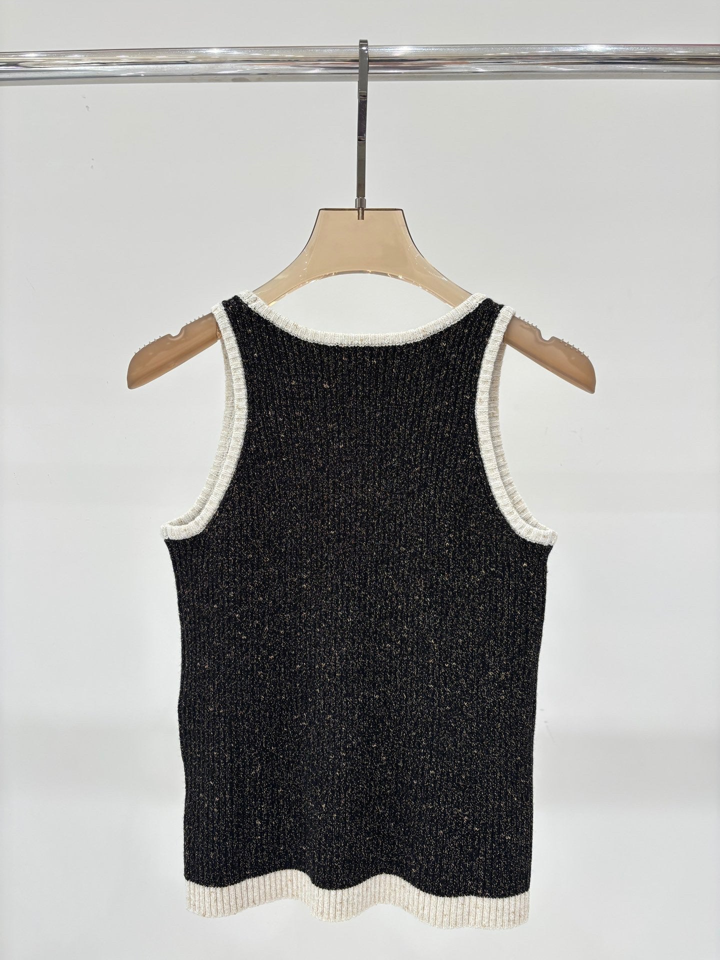 Débardeur en tricot tweed noir et blanc à motifs métallisés 